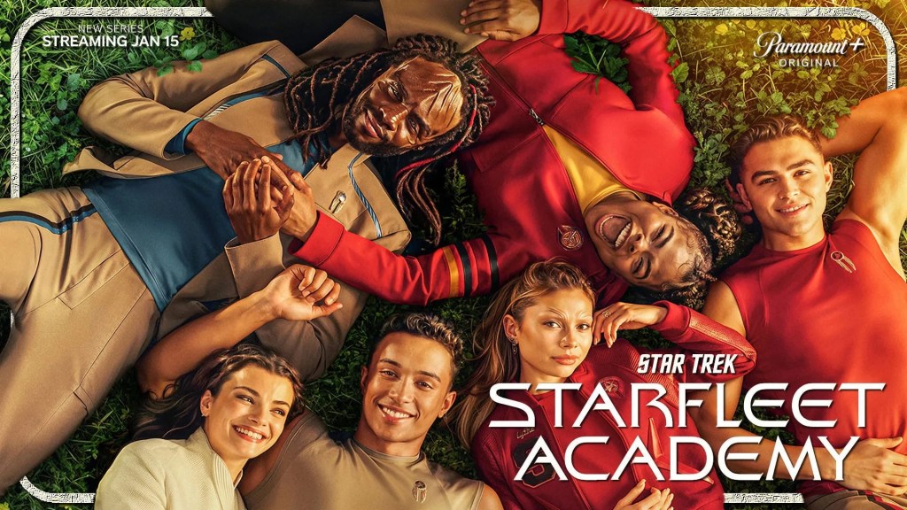 An overhead shot of the diverse young main cast of Star Trek: Starfleet Academy smiling and lying on green grass, forming a star shape. The show's title logo is prominently displayed in the lower right, highlighting the youthful spirit of the 32nd-century Starfleet.